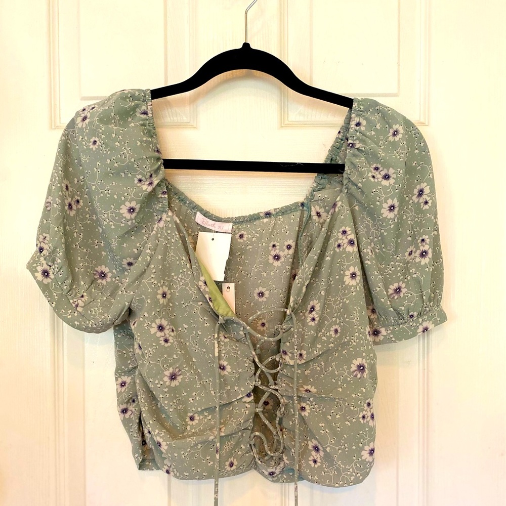 Cute top with cross tie front, size large